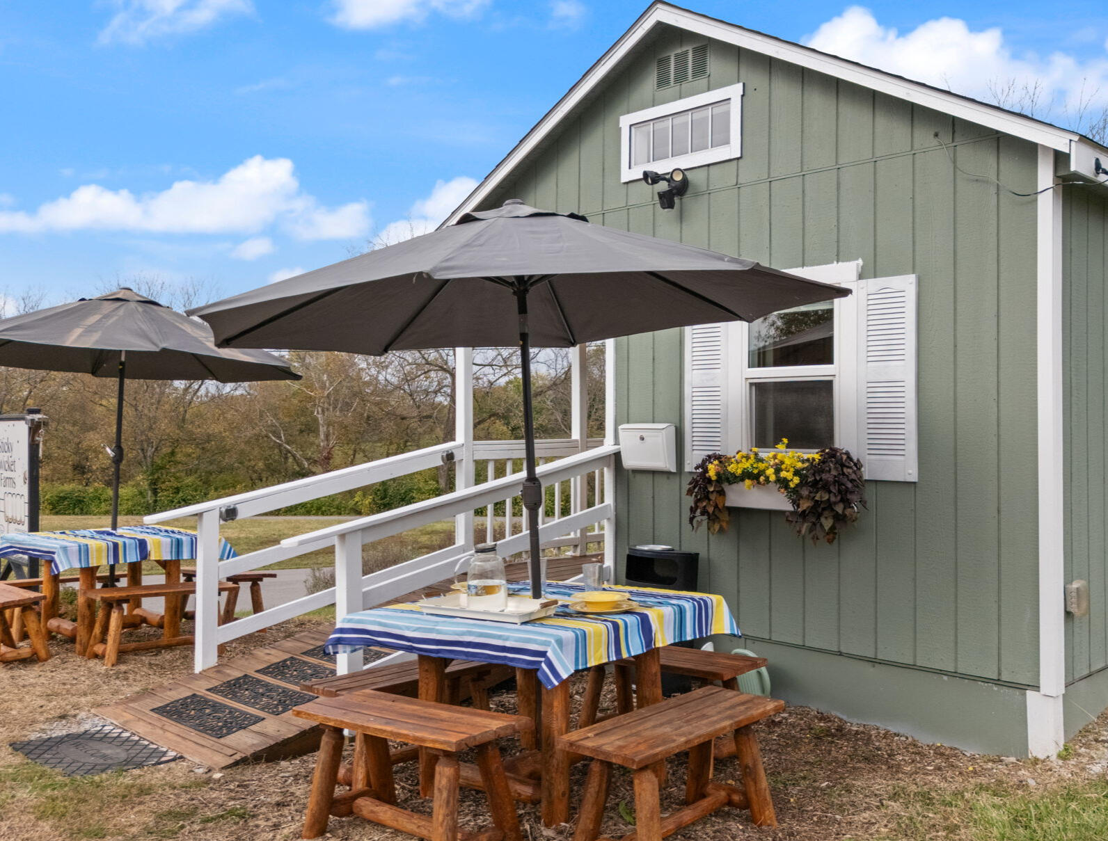 Picnic Tables w Umbrellas for your outdoor dining. Picnic Tables w Umbrellas for your outdoor dining.
